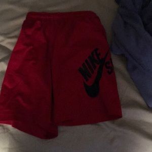 Red nike shorts